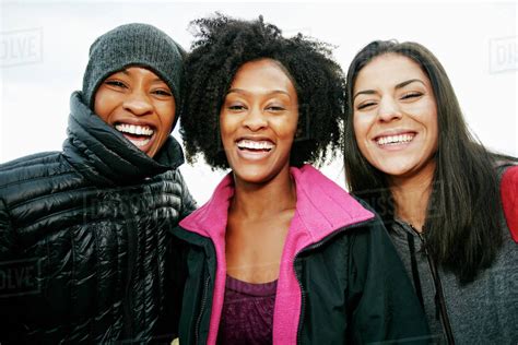 Portrait of smiling Black women - Stock Photo - Dissolve