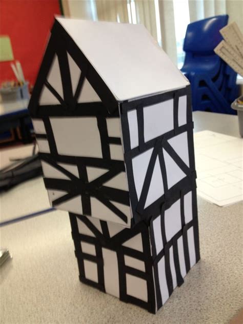 Tudor house in year 4, made with 3d shape nets and symmetrical patterns on the outside. Good ...