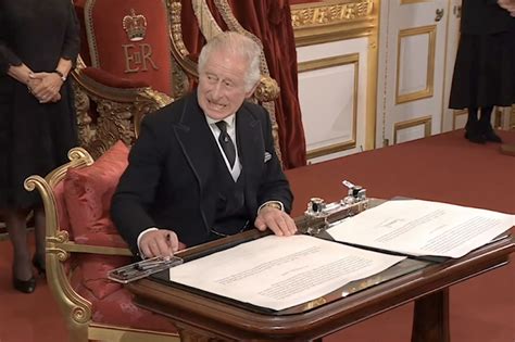 King Charles III furiously gesturing aides to clear pen and ink goes viral