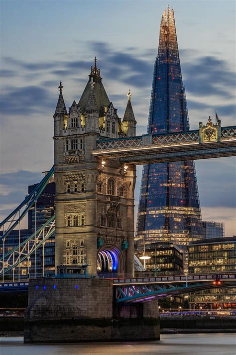 The Shard and Tower bridge in London, England, seen last night at blue hour. Photograph by ...