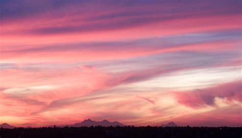 Sunset Colored Clouds Photograph by Elvira Butler | Fine Art America