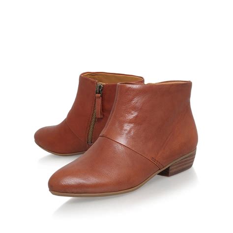 Nine west Ezout Flat Ankle Boots in Brown | Lyst