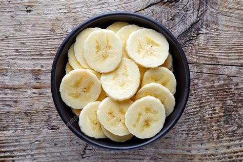 Bowl of sliced banana from above — Stock Photo © bigacim.gmail.com #137893794