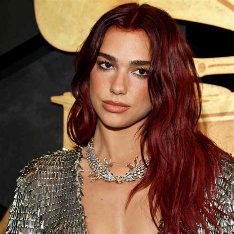 Dua Lipa Matched Her Metal Eye Darkness to Her Gown at the 2024 Grammys | Dreamfaraway.com
