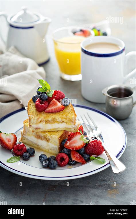 Baked french toast with cream cheese filling Stock Photo - Alamy