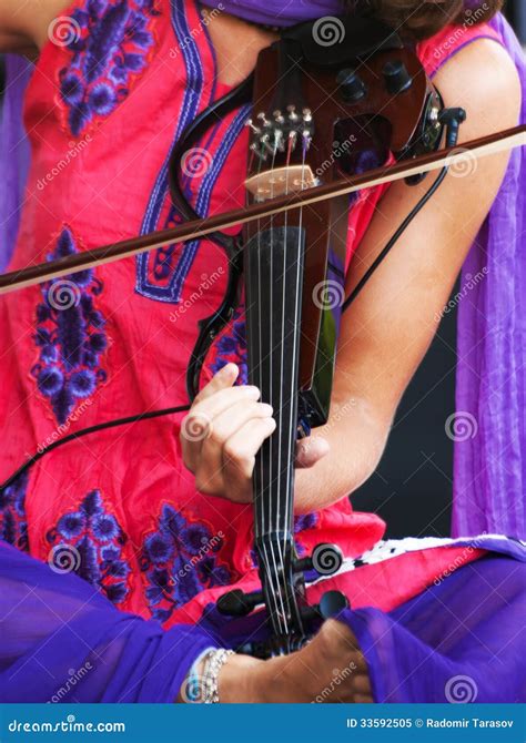 Hands of a Musician Playing the Electric Violin Stock Image - Image of player, playing: 33592505