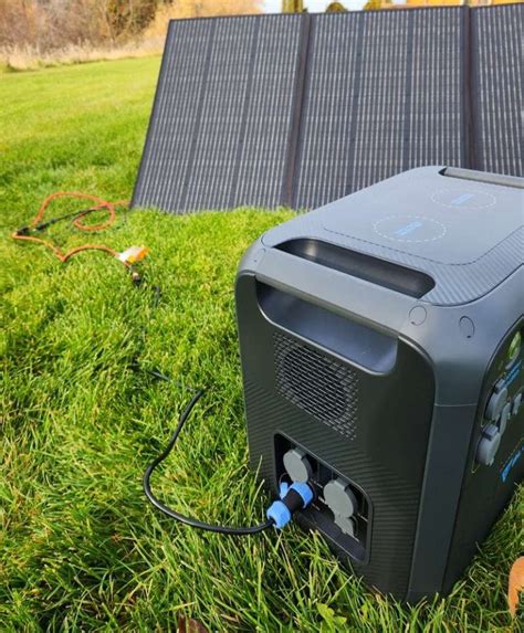 BLUETTI AC200MAX connected to solar panels showing cables | The ...