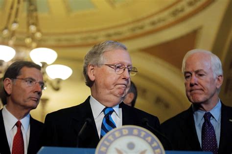 Senate Majority Leader Mitch McConnell (R-Ky.) attends a news ...