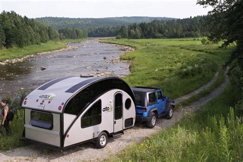 Compact teardrop trailer transforms into a large family camper | Teardrop trailer, Small camper ...