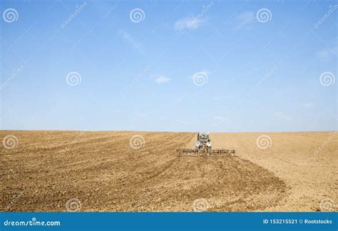 Harrowing the Soil with Tine Harrows Stock Image - Image of plough, implement: 153215521