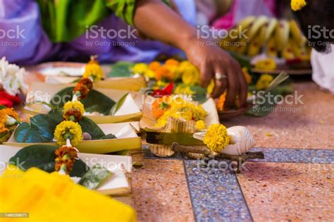 Hindu Puja Rituals Being Performed With Flowers In Front Of Priest ...