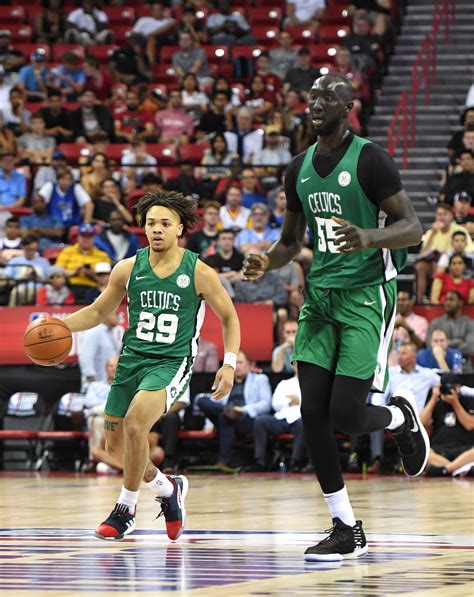 NBA: Tacko Fall towering over NBA players photos