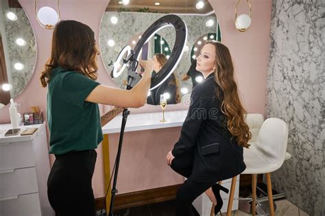 Makeup Artist Photographing Woman in Beauty Salon Stock Image - Image of human, makeup: 243259211