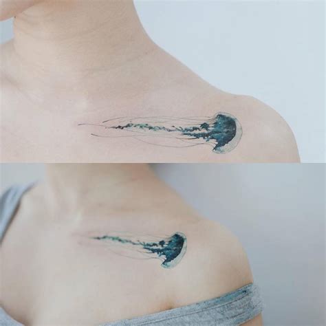 Jellyfish tattoo on the left collarbone/shoulder.