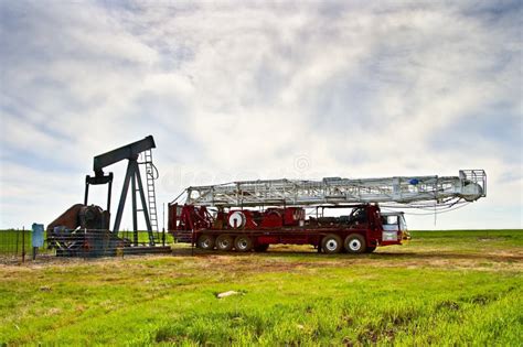 Two Oil Field Pulling Units Stock Photo - Image of pumpjack, outdoors: 7649094