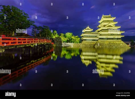 Night view of the Matsumoto Castle (or Crow Castle) and bridge, in ...