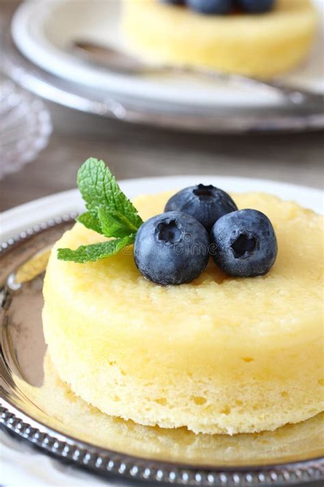 Delicious Lemon Pudding Cake Served with Berries Stock Image - Image of ...