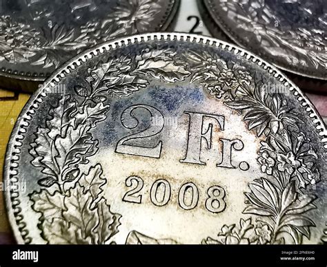 Coins and Swiss Francs banknotes Stock Photo - Alamy