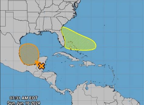 Hurricane center watching two areas, one off Florida coast