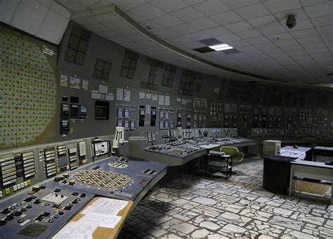 an old control room with lots of buttons and other items on the desks ...