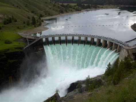 Kerr Dam - Polson, Montana. Dam gates are fully open in this image, to assist in flood control ...