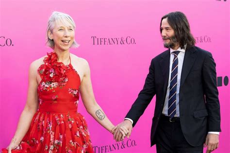 Keanu Reeves and girlfriend Alexandra Grant step out on red carpet