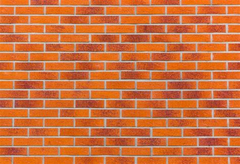 Premium Photo | Brick wall cladding facade background texture