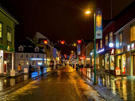 Tromso Christmas Shopping Photograph by Mark Llewellyn - Fine Art America