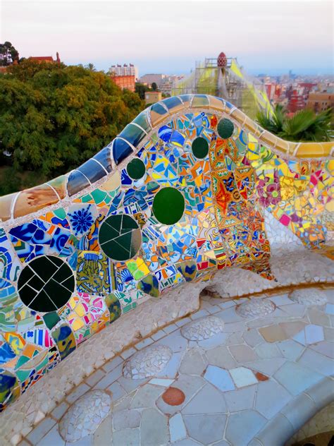 Rooftop benches with beautiful mosaic tile work at Antonio Gaudi's Parc Guell; Barcelona ...