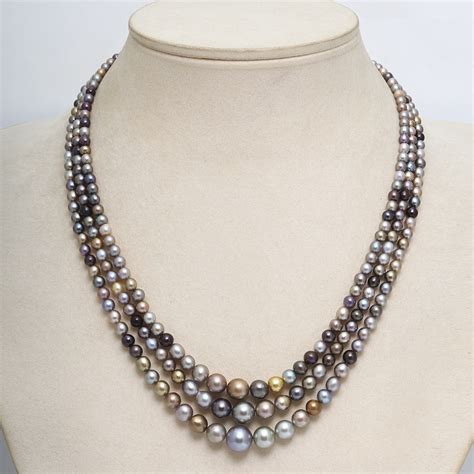 Rare Natural Black and Multi-color Pearl Necklace. Three-row graduated natural black and multi ...