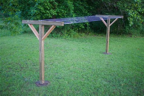 DIY Clothes Line: How to Make a Clothesline Post out of Wood in 2024 | Diy clothesline outdoor ...