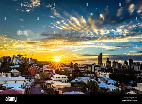 Brisbane City skyline at sunset Stock Photo - Alamy