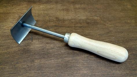 STANDARD ONE HAND FLESHING TOOL – Southern Snares & Supply