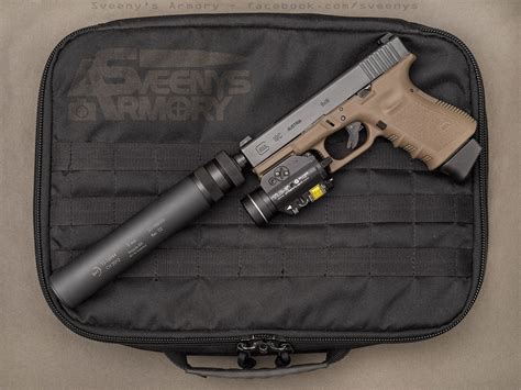 Glock 19 with suppressor and laser/light [1600x1200][OC] : r/Glocks