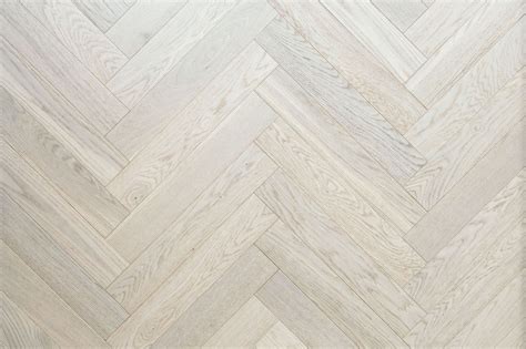 White lacquered engineered herringbone parquet UK | Project White