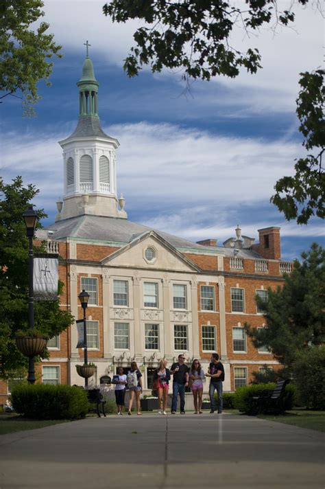 Students walking on Ohio Dominican's campus in front of Erskine Hall. http://www.ohiodominican ...