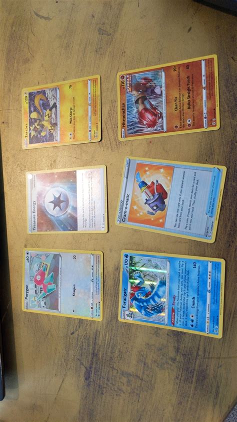 here is what I got from a Eevee tin I got for Christmas : r/PokemonTCG