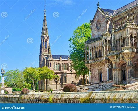 COMILLAS PALACE NEXT TO CHURCH Stock Image - Image of church, tourism ...