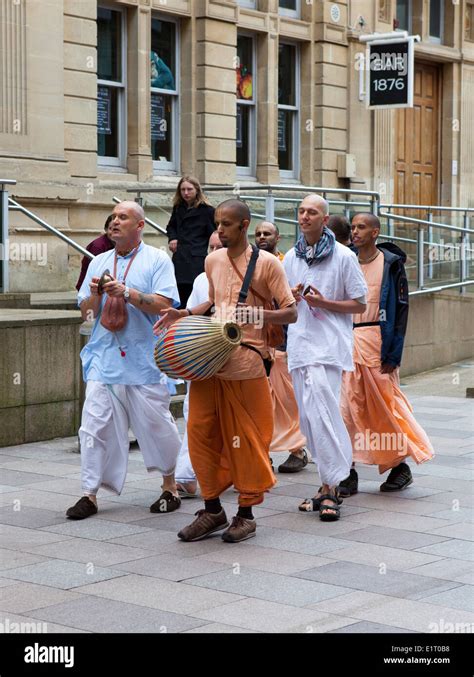 Men practicing Hare Krishna religion chanting through Cardiff City centre, Wales, UK Stock Photo ...