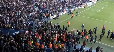 Players taken off the pitch due to fan trouble as Wolves lead West Brom ...