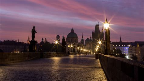 Charles bridge in Prague at night and in the morning - Jens Assmann ...