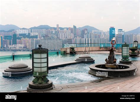 The Rooftop Swimming Pool of the Harbour Grand Hotel Kowloon with Hong ...