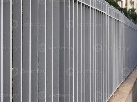 grey metal fence 13924324 Stock Photo at Vecteezy