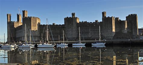 Sunrise Caernarfon Castle&boats | By Caernarfon castle. | Flickr