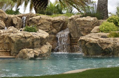 Spectacular 'Resort Style' swimming pool environment featuring our incredible artificial rock ...