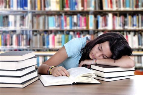 Tired Student Sleeping at the Desk in a Library Stock Image - Image of adult, deadline: 32773007