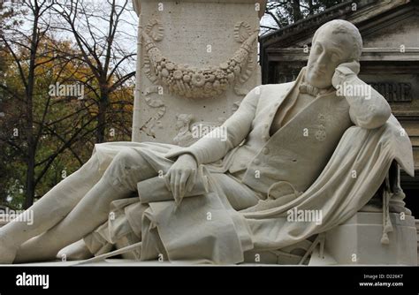 Sculptures from the Pere Lachaise Cemetery Paris, France Stock Photo ...