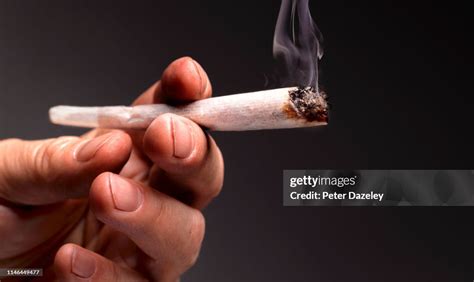 Marijuana Joint Cigarette Close Up High-Res Stock Photo - Getty Images