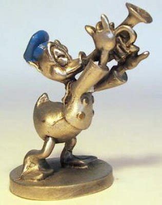 Donald Duck playing trumpet pewter figure from our Pewter collection ...