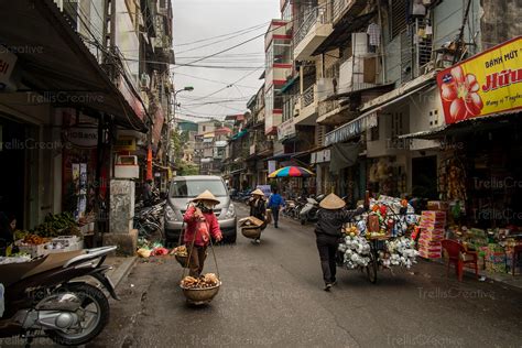 Image: Vietnamese street vendors, Hanoi, Vietnam High-Res Stock Photo - TrellisCreative.com